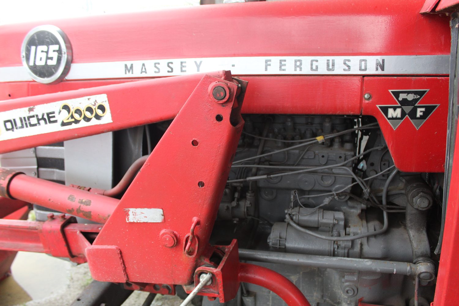 The farm's red Massey Ferguson 165 tractor